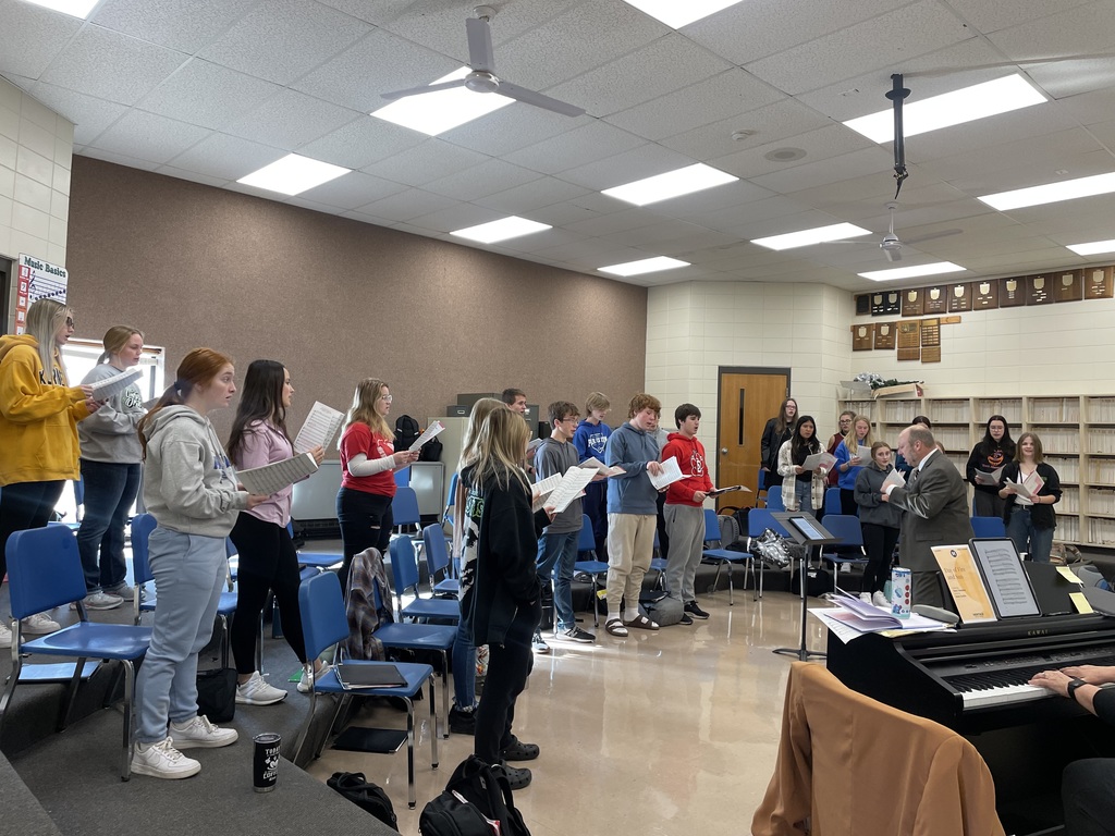 Parkston HS choir works with Dr. Desmond from DWU. 